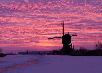 Winterse Zonsopkomst Winterse zonsopkomst op Kinderdijk